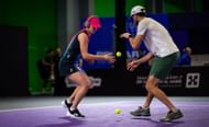 Swiatek warming up before her match in the WTA Finals - Source: Getty